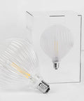 Ampoule LED à filament E27 dimmable - verre ligné clair - 2700K - 4W - La Quincaillerie Remoise